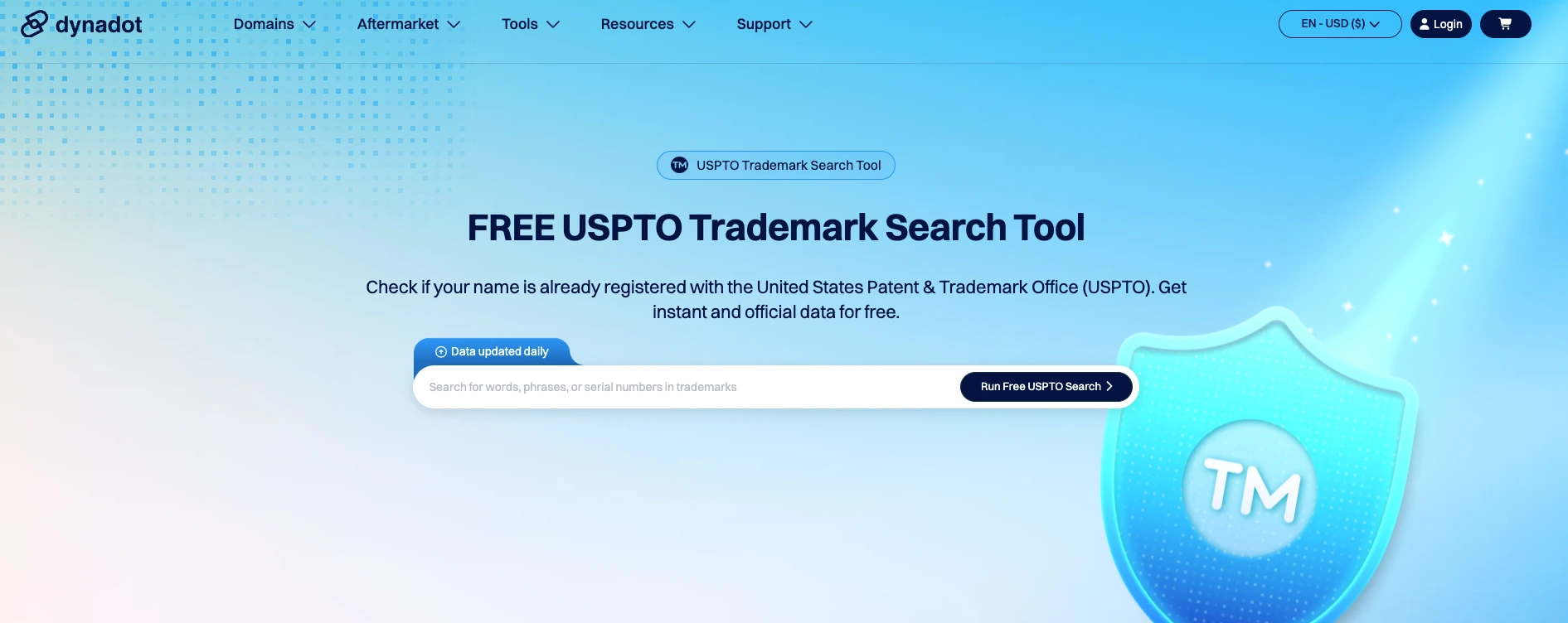 Dynadot recap 2025 screenshot of Dynadot’s Free USPTO Trademark Search Tool page with a large search bar and a blue TM shield illustration.