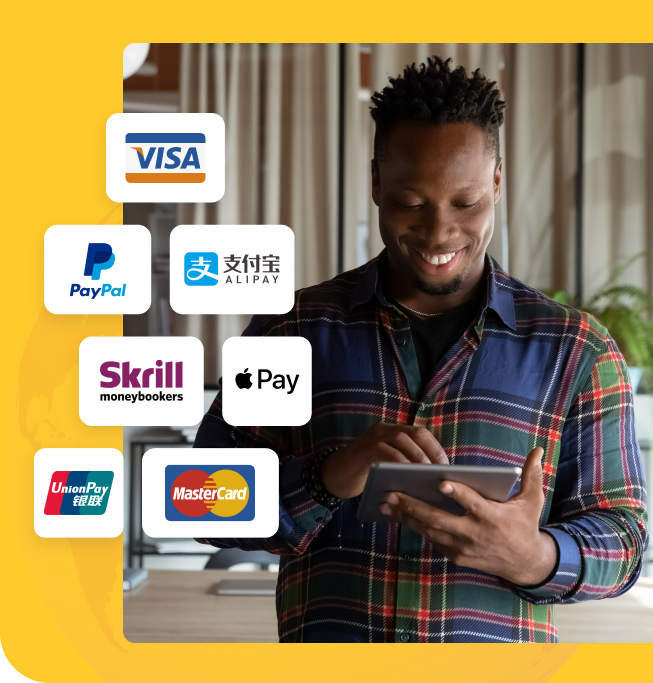 young man smiling while using his tablet with payment brand logos shown such as visa, paypal, alipay, apple pay, and union pay